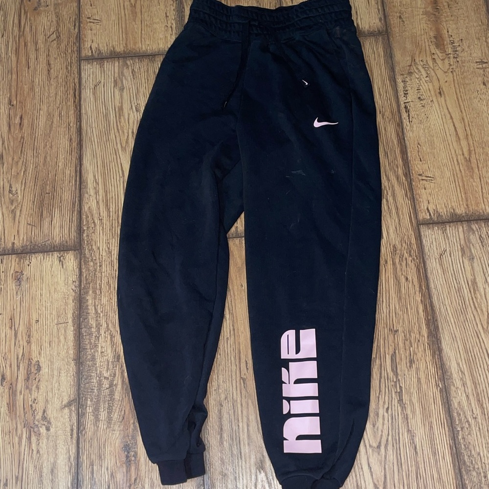 Nike sweat pants with light pink letters